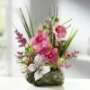 Orchideen-Gesteck Auf Stein -Heim Schmücken Geschäft orchideen gesteck auf stein farbe rosa