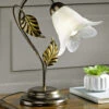 Tischleuchte Aus Metall Mit Dekorativem Blattwerk -Heim Schmücken Geschäft tischleuchte aus metall mit dekorativem blattwerk farbe braun schwarz gold